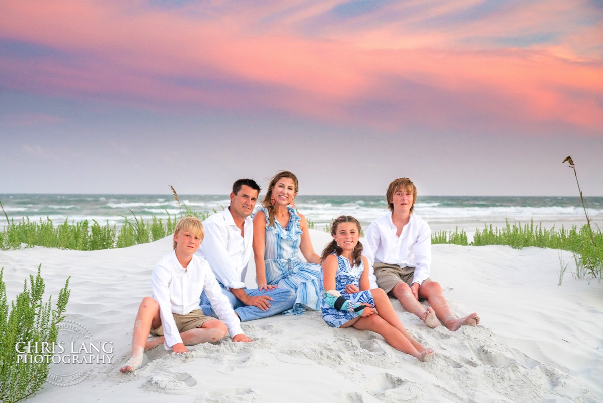 topsail Island Photography - family portrait photography - topsail island nc family portrait photpgraphers - image of family on beach - sunset family picture -  chris lang photography
