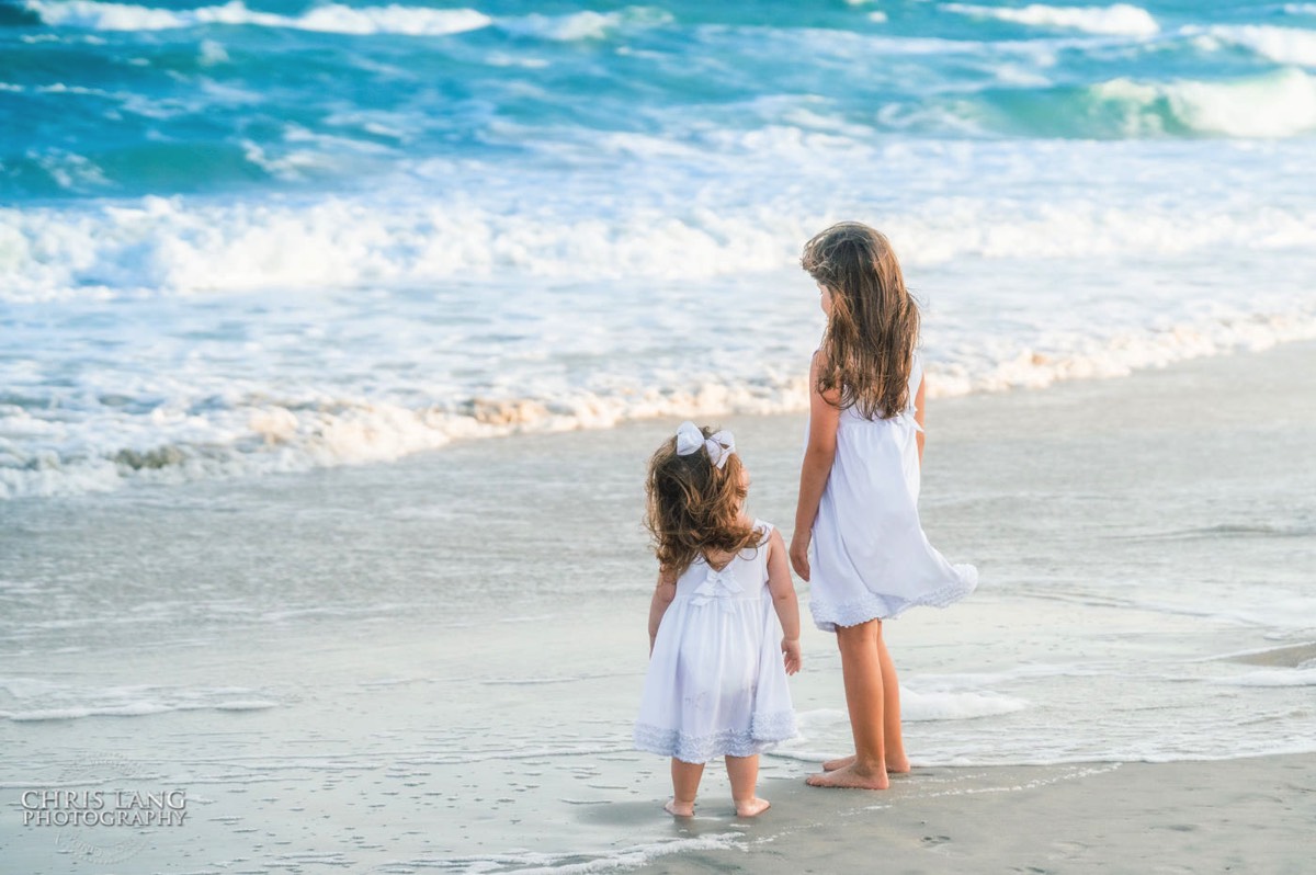  Kids walking in the water at the beach -Topsail Island Photography - Topsail Island NC Photographers - Chris Lang Photography -  Beach Photography - Family Photographer - Family photo - Beach Photographer - Beach Portraits -  Coastal Lifestyle Photography