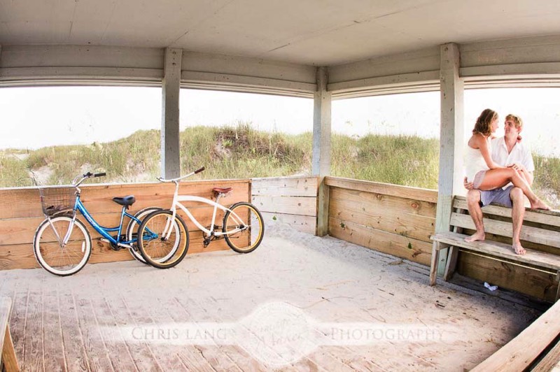 Lifestyle picture of couple riding bikes at Access 43 Wrightsville Beach NC