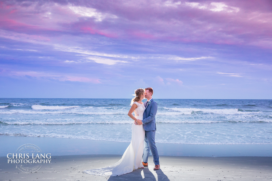 North Carolina Beach Weddings - Bride & Groom on the beach - Sunset Beach Wedding Photo - NC Beach Wedding Photographers - Beach Wedding Ideas - Chris Lang Photography - Wedding Dress - Destination Wedding