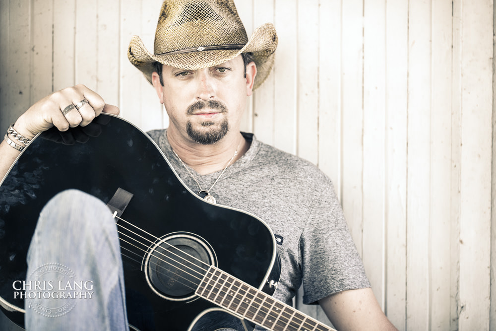 Professionl musician posing for headshot with guitar -Creative headshot - NC headshot photographer - Wilmington NC Headshots - Chris Lang Photography