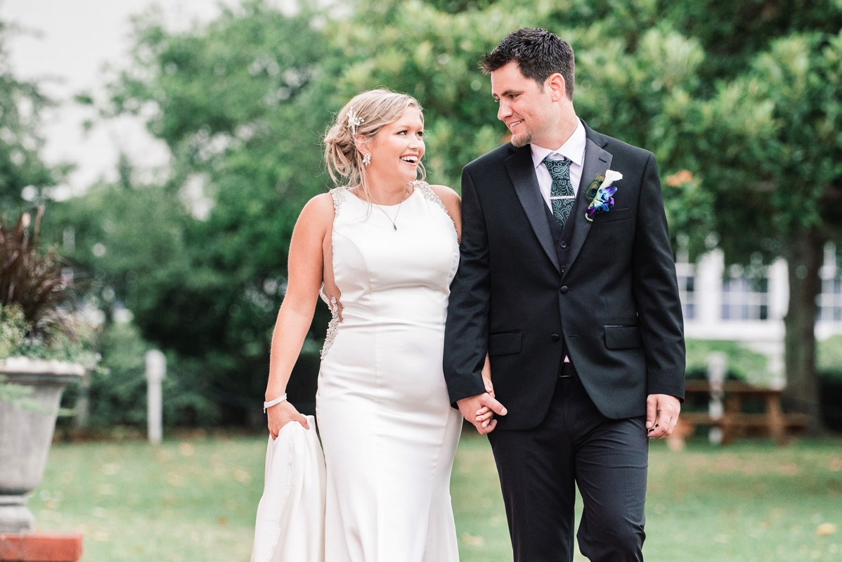 Bride & groom walking while holding hands - wedding inspiration - Wilmington NC Wedding Photographer - Wedding Photography - Wedding Photo - Chris Lang Photography